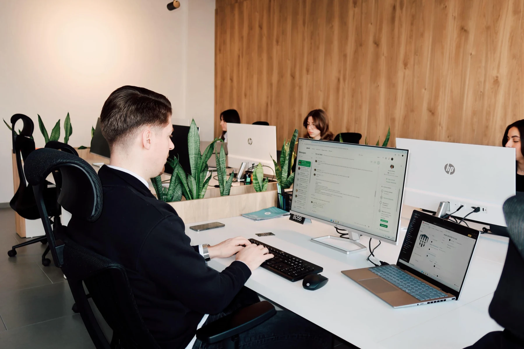 A member of the EdonyDev team developing software in our office