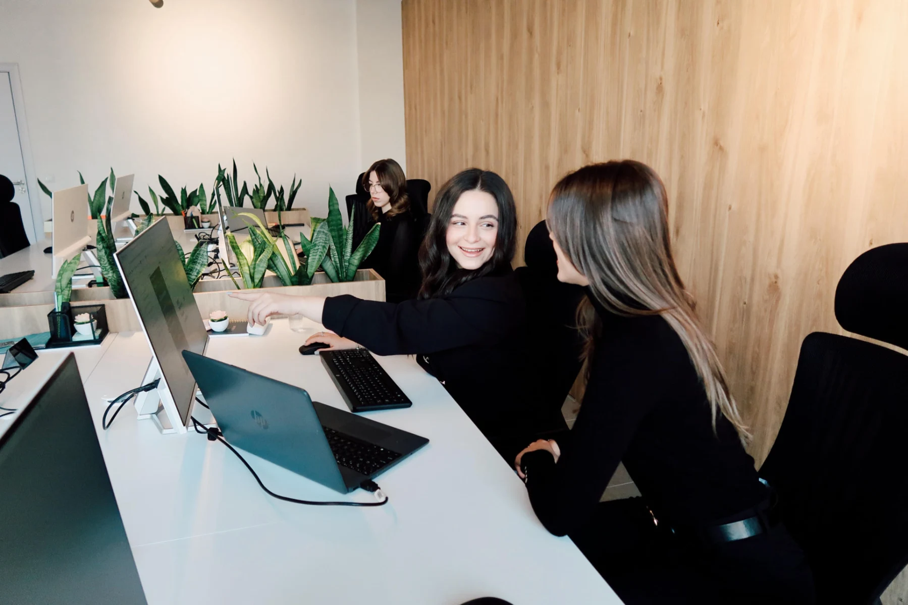 EdonyDev developers reviewing a product together